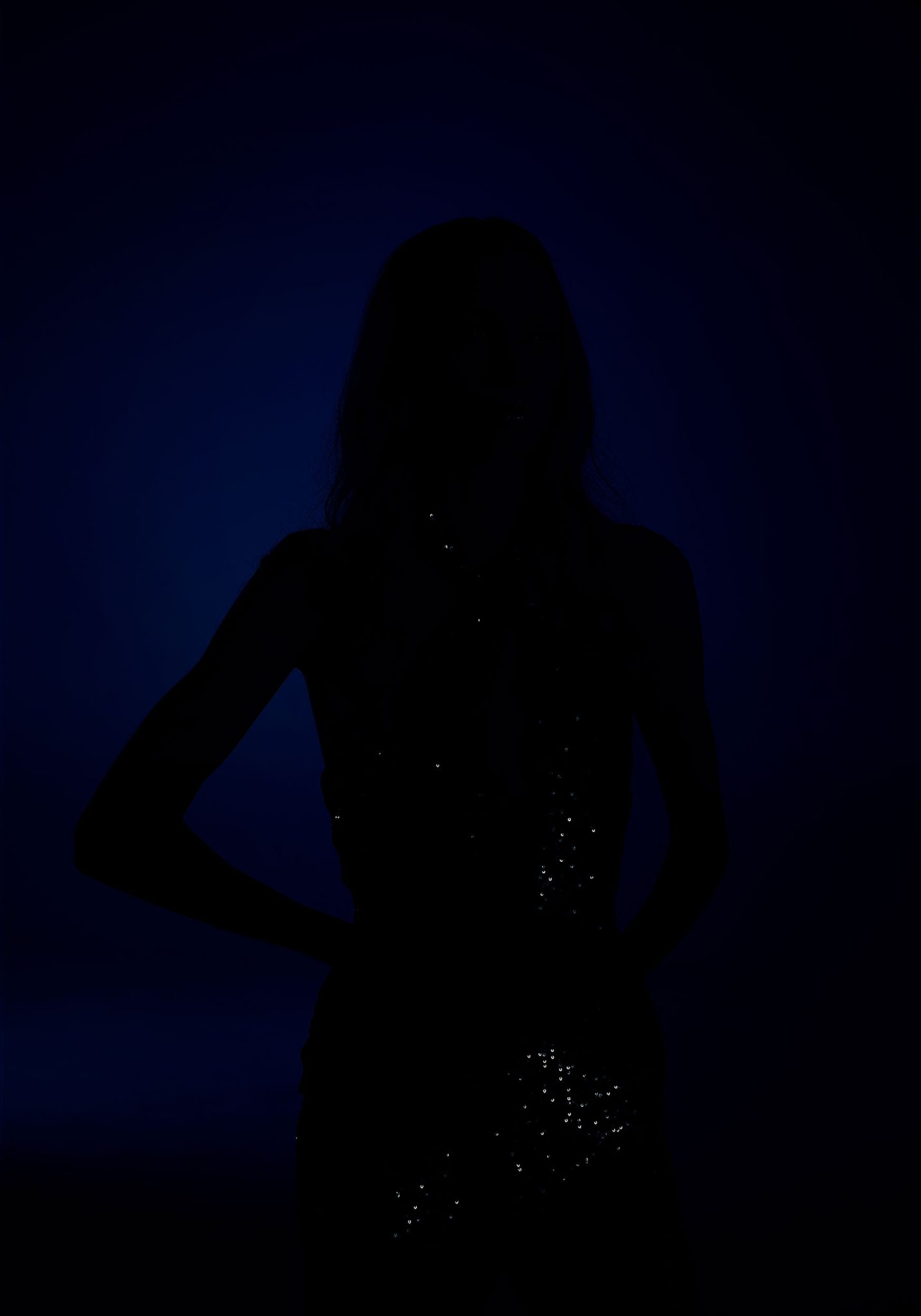 Back light only using FJ400 with Rapid Box 1x3 softbox and blue FlexiGel Model with gelled back light