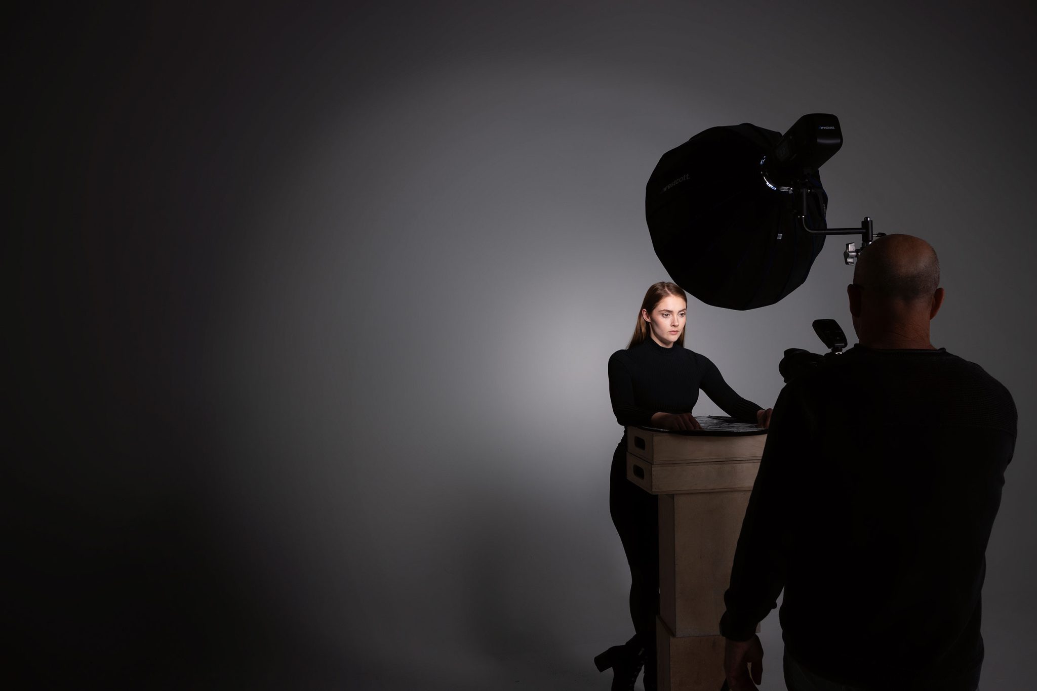 Behind the scenes look at Joel Grimes using the Rapid Box Beauty Dish for a clean portrait lighting setup.