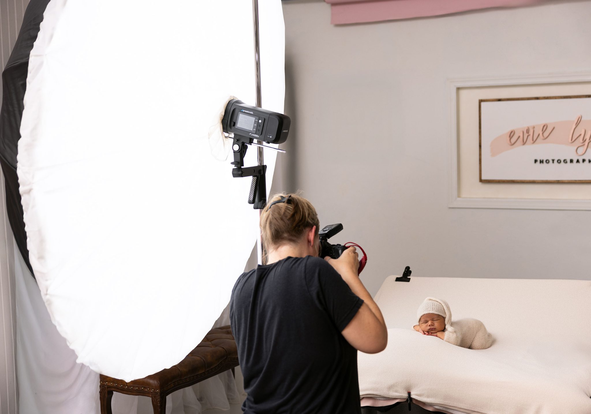 Behind the scenes look at the FJ400 II and 7-ft umbrella positioned at 90-degrees for gentle shadow depth.