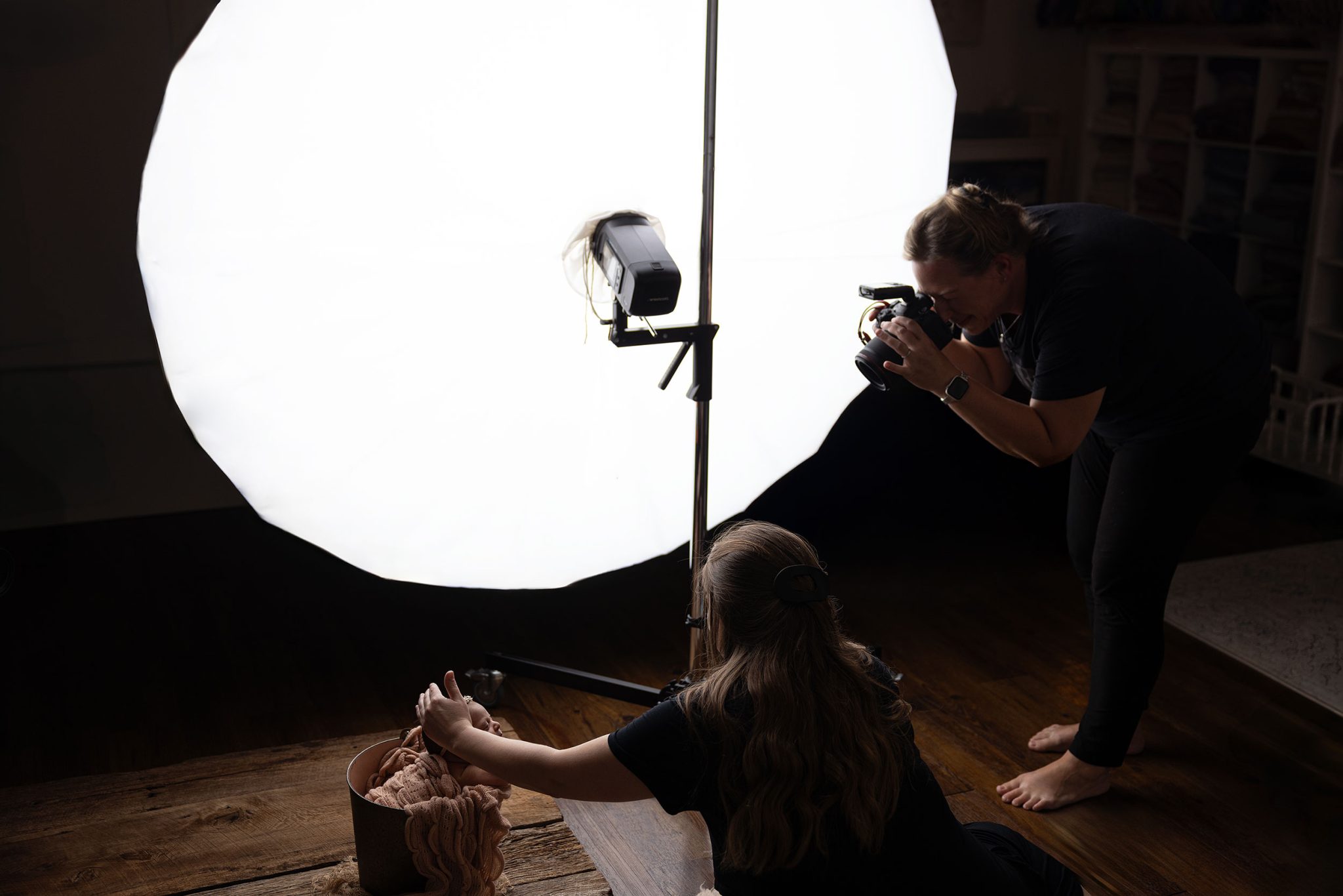 Behind the scenes of safe prop setup with spotter nearby and one-light FJ400 II setup.