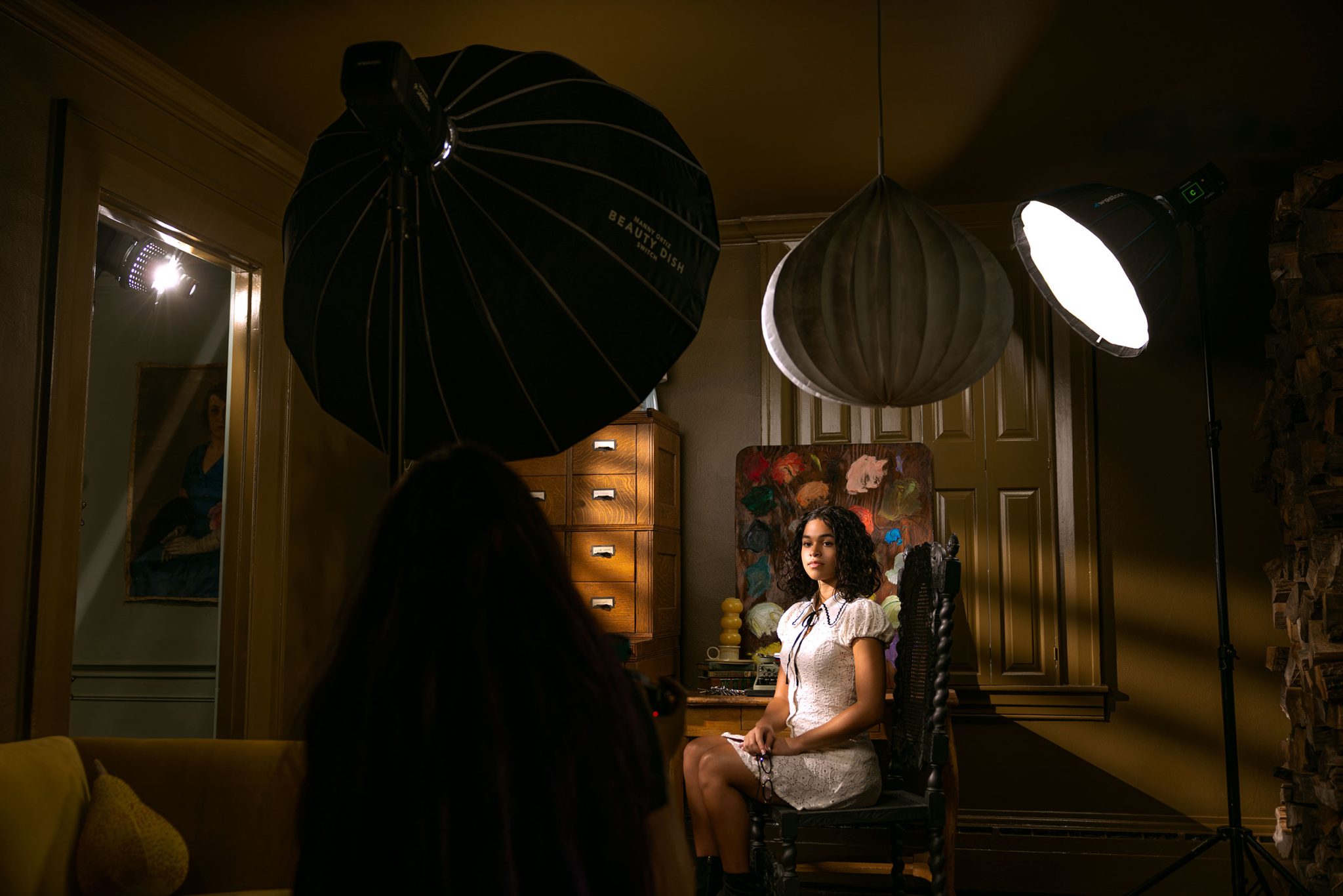 Behind the scenes look at how Julie Gayler mimics window light with flash to control direction and mood.