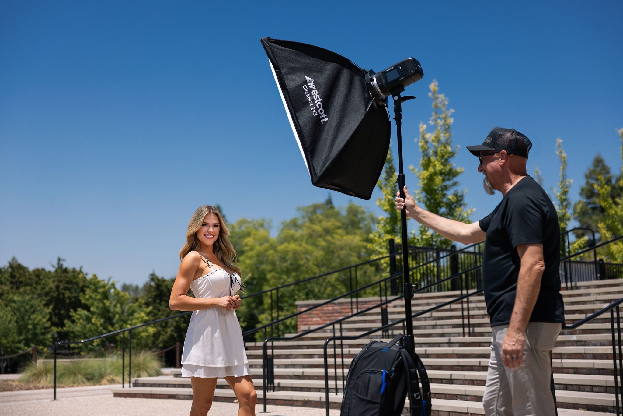 CD1A2825 Behind the scenes showing the FJ400 II and ClickBox softbox setup to balance flash with harsh midday sunlight.