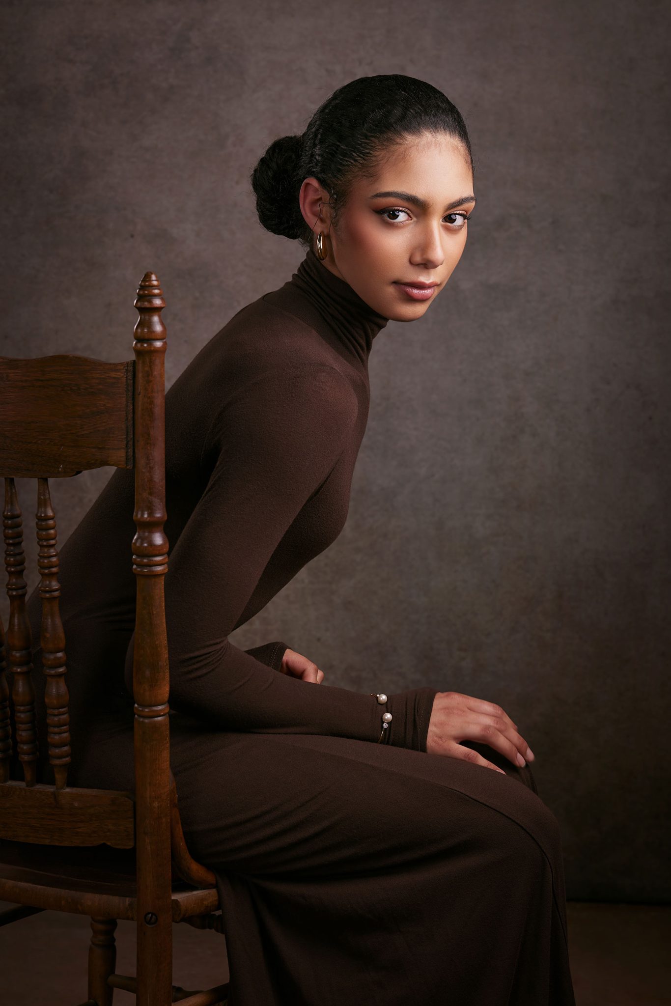 Classic studio portrait lit with key fill and rim lights for a clean dimensional look Classic studio portrait lit with key fill and rim lights for a clean dimensional look