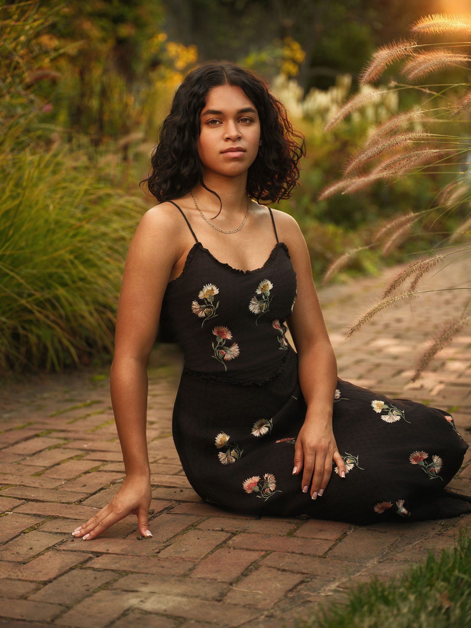 Soft, warm portrait using off-camera flash to mimic sunset light while the beauty dish lights the face.