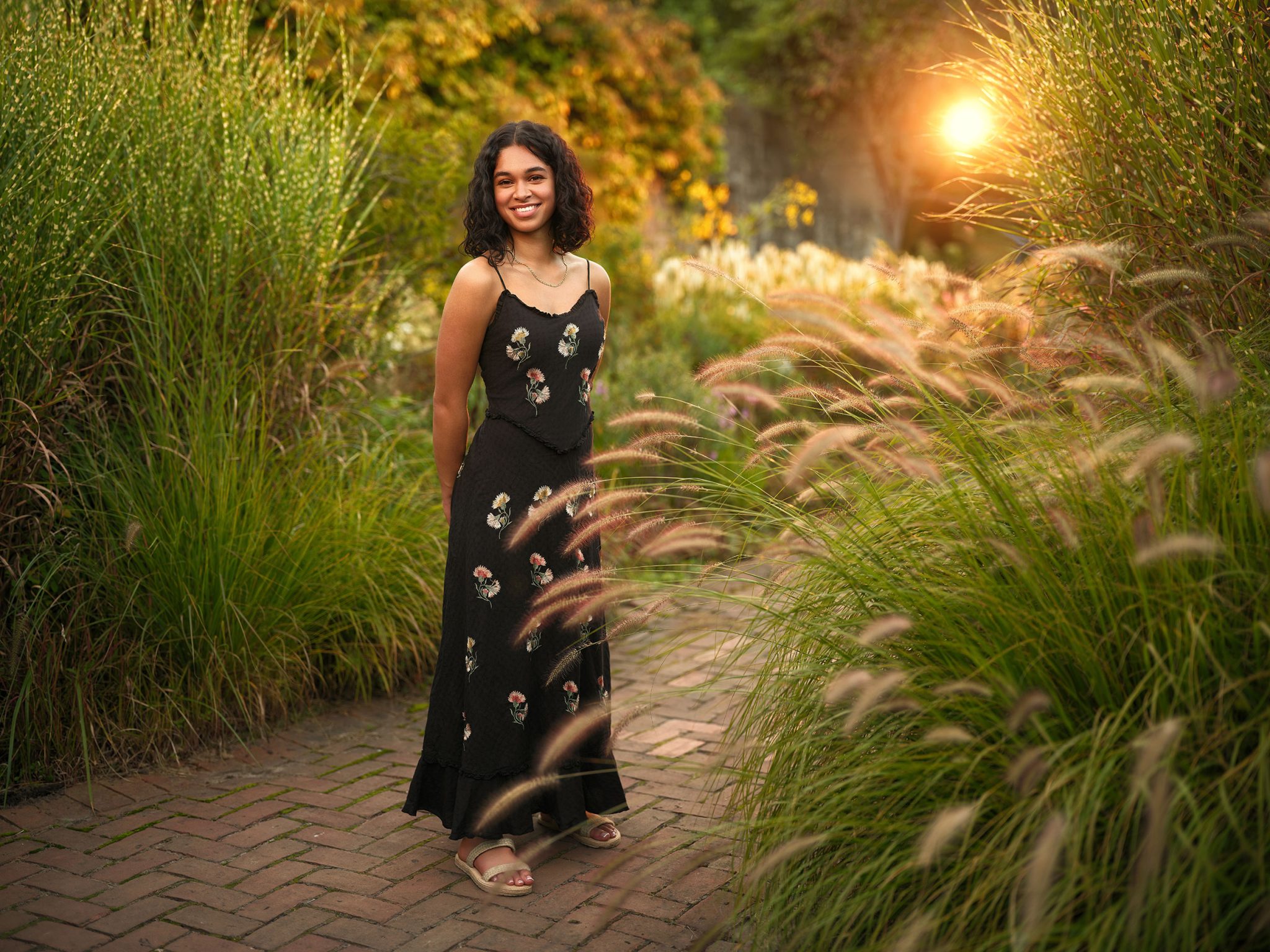 Recreated golden hour using a high, gelled backlight to mimic the sun and add warm highlight to the scene.