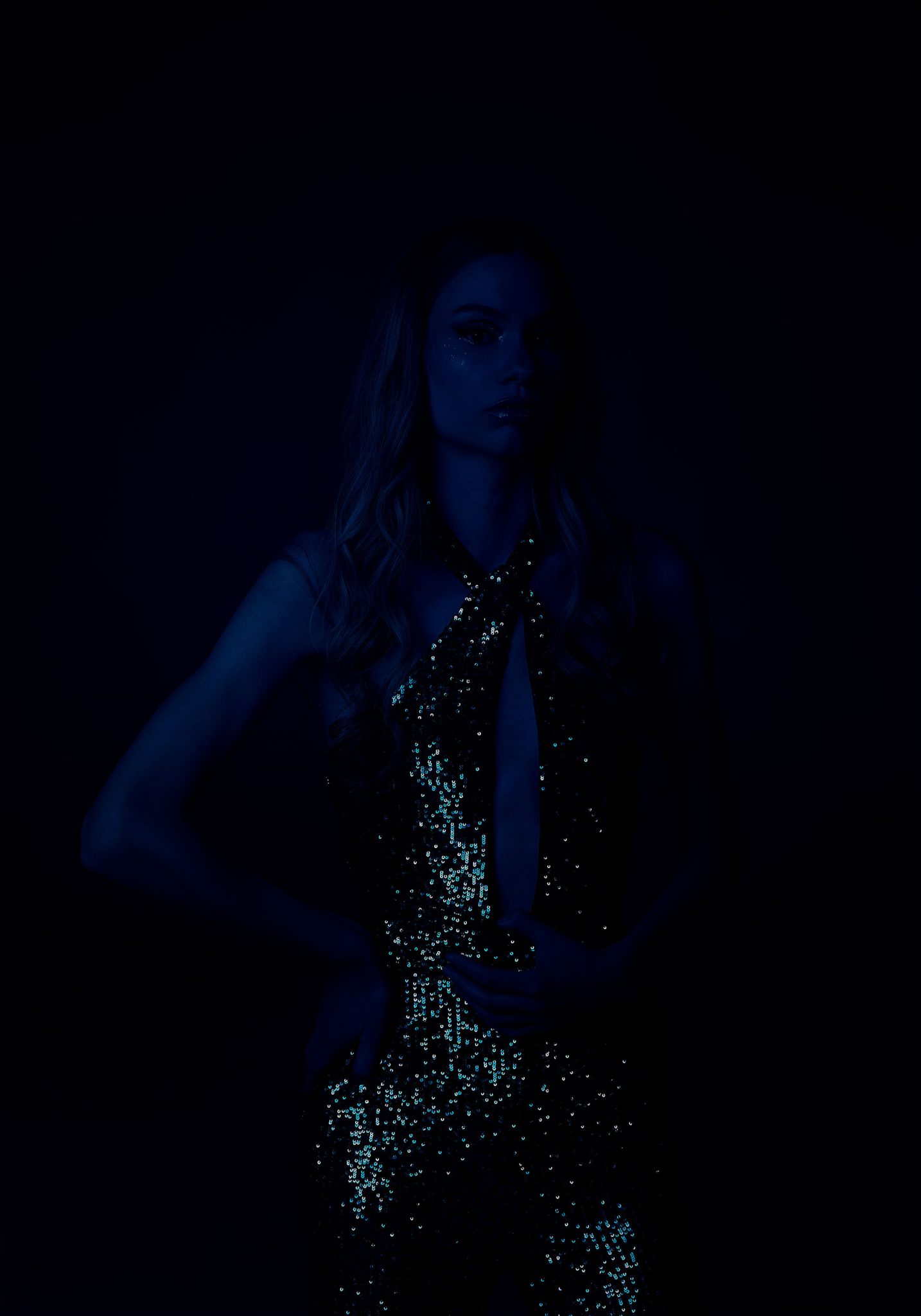 Fill light only using FJ400 with 53-inch Deep Umbrella and blue FlexiGel Model with gelled fill light