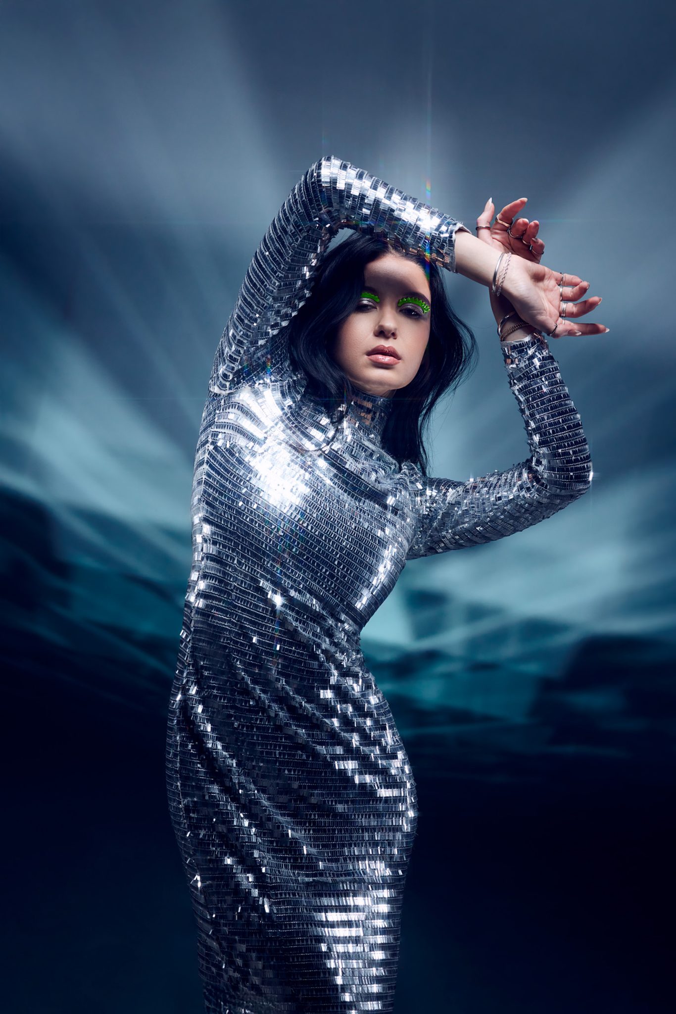 Final image featuring crisp geometric reflections from a DIY mirror prism and focused LED light.