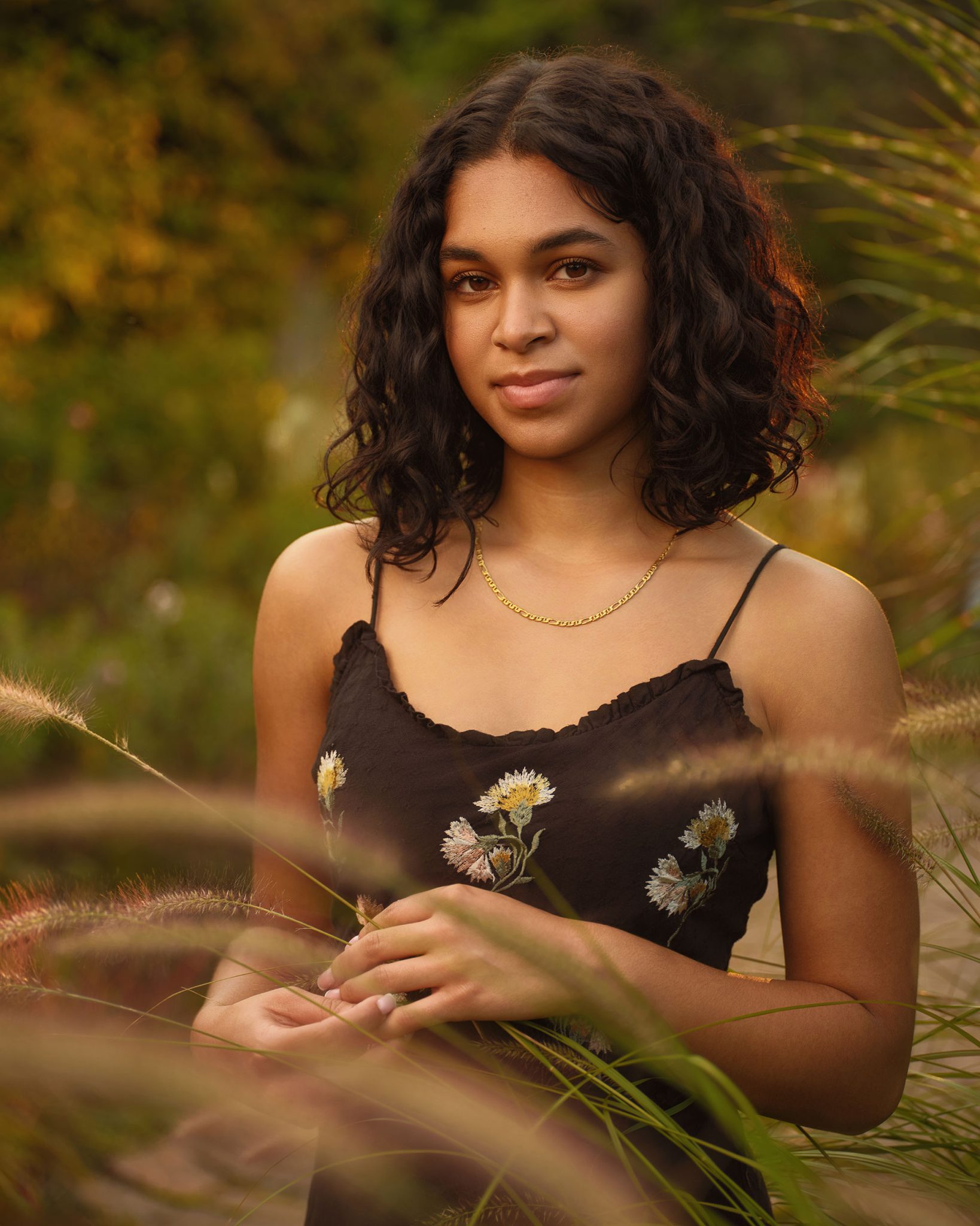 Recreated sunlight using a gelled FJ800 placed high and far back for a natural golden hour glow.