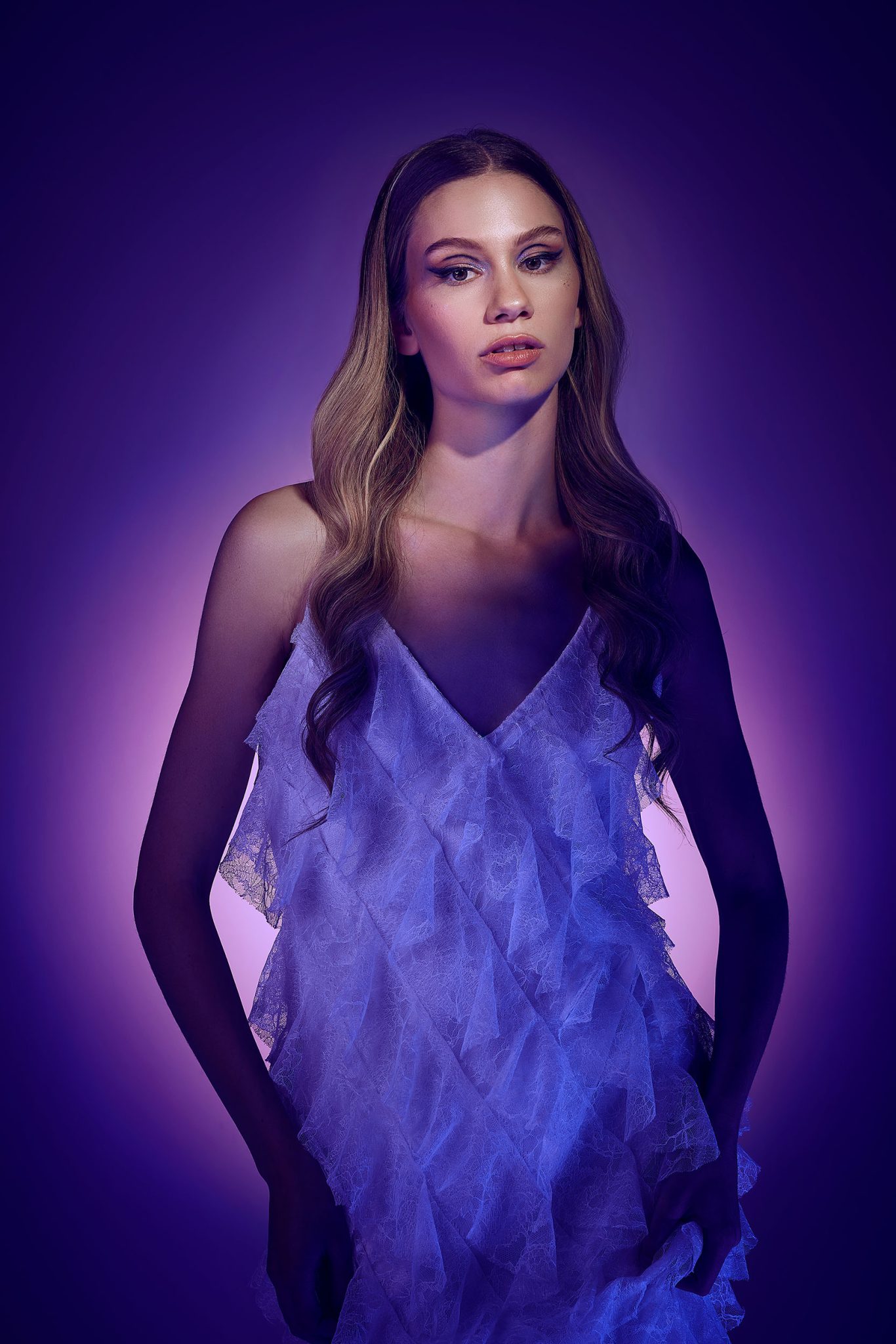 Final soft gel portrait created with all lights and Westcott FlexiGels Model shot with a combinations of gelled lighting