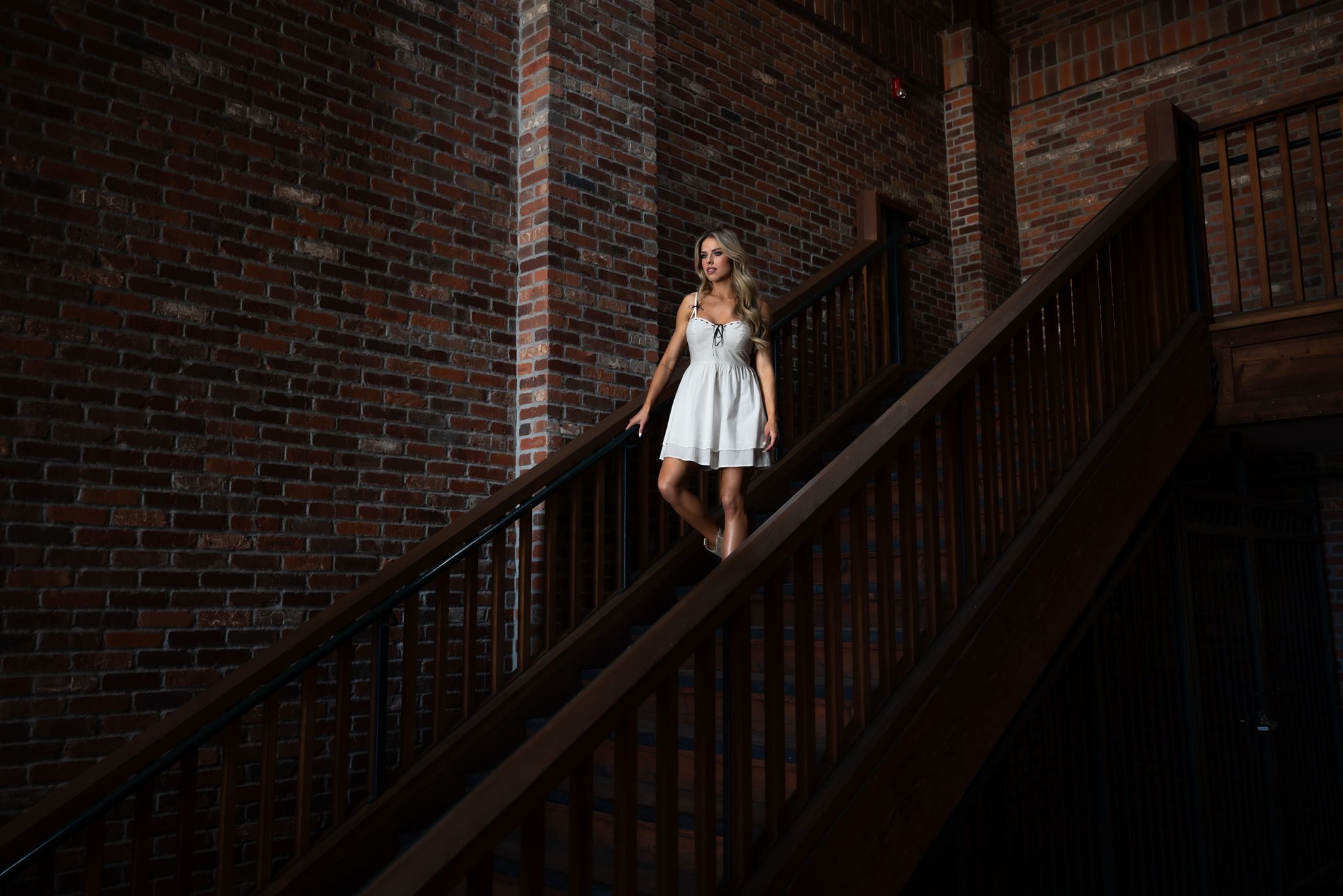 NZ8_2468 Portrait with Westcott FJ400 II and 2x3 ClickBox softbox at higher power 3.5 for a dramatic stairwell look.