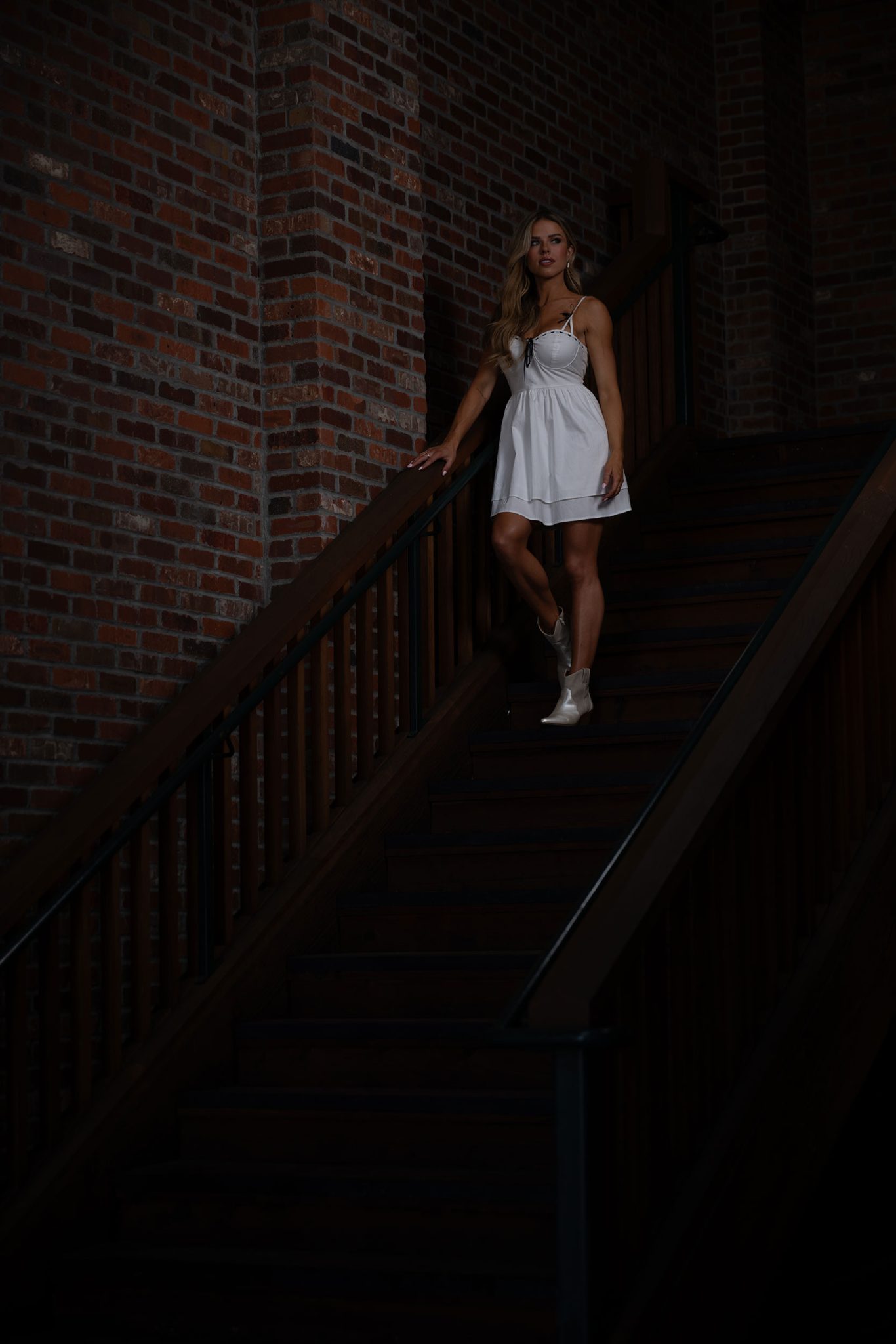 NZ8_2483 Portrait in the stairwell using only ambient light before adding flash.