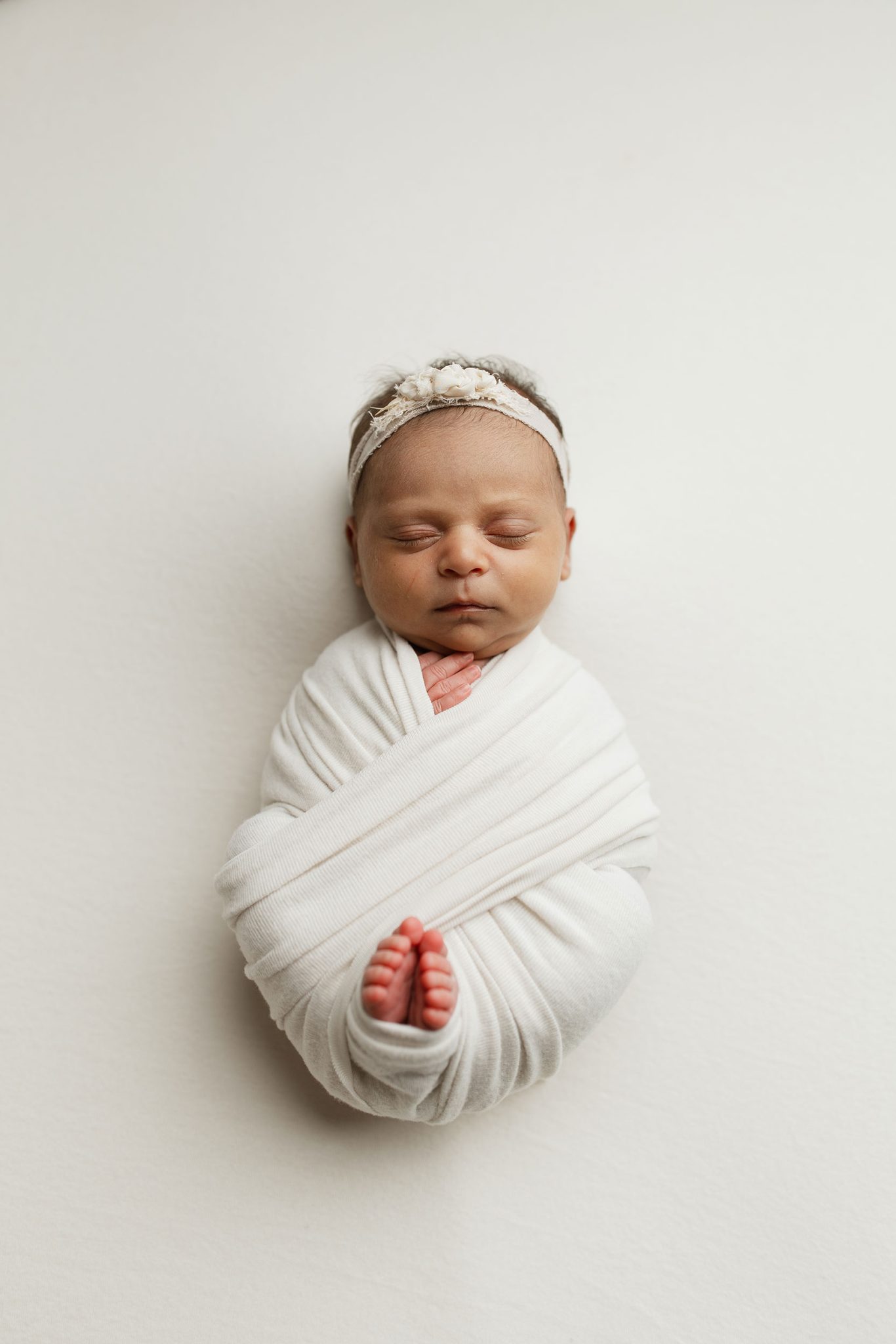 Shooting from too low creates an unflattering “up the nose” angle.