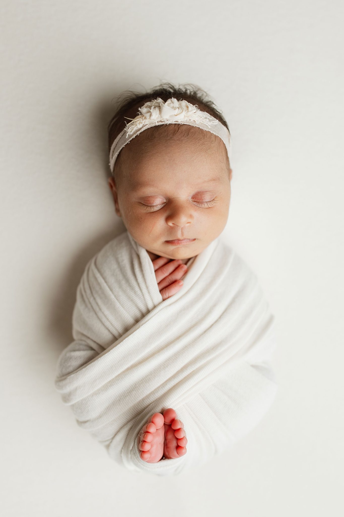 Uplighting shows how bottom light can create unflattering shadows on the baby’s face.