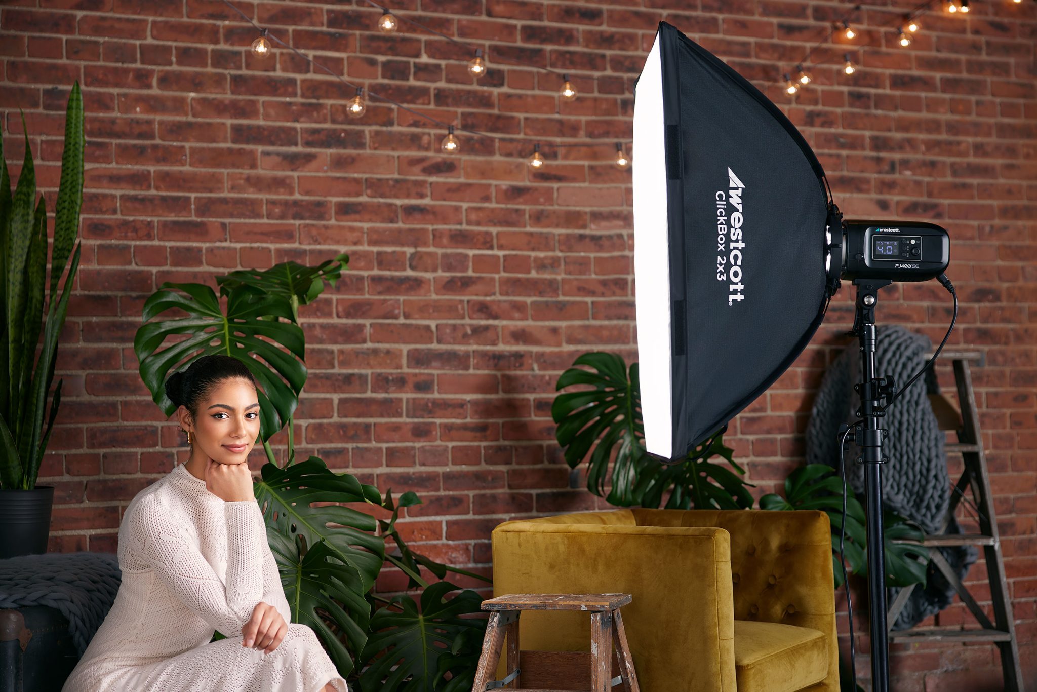 One-light studio setup using the FJ400-SE with a 2×3 ClickBox balanced with ambient window light One-light studio setup using the FJ400-SE with a 2×3 ClickBox, balanced with ambient window light