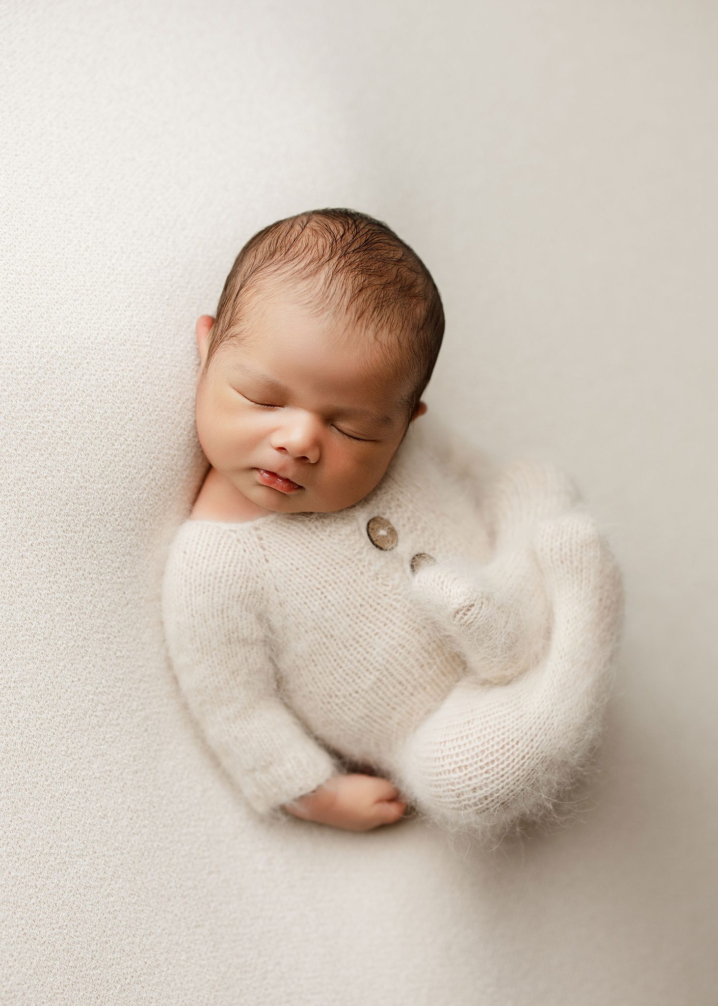 Edited final image showing safe posing with the parent’s hand removed in post.