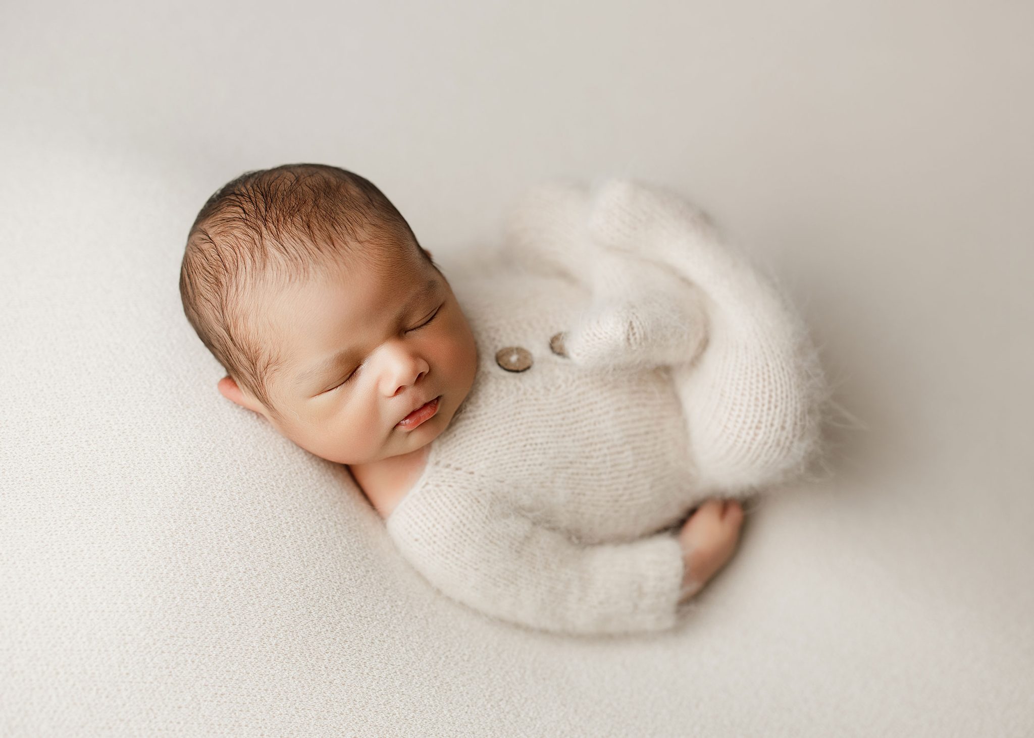 One-light setup with the 7-ft umbrella provides smooth highlights and a timeless look.