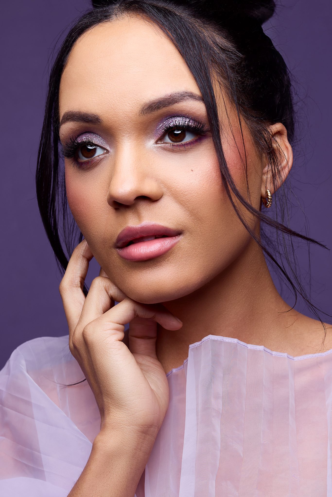 Portrait using a single beauty dish only, showing deeper shadows under the chin and less fill light in the eyes.