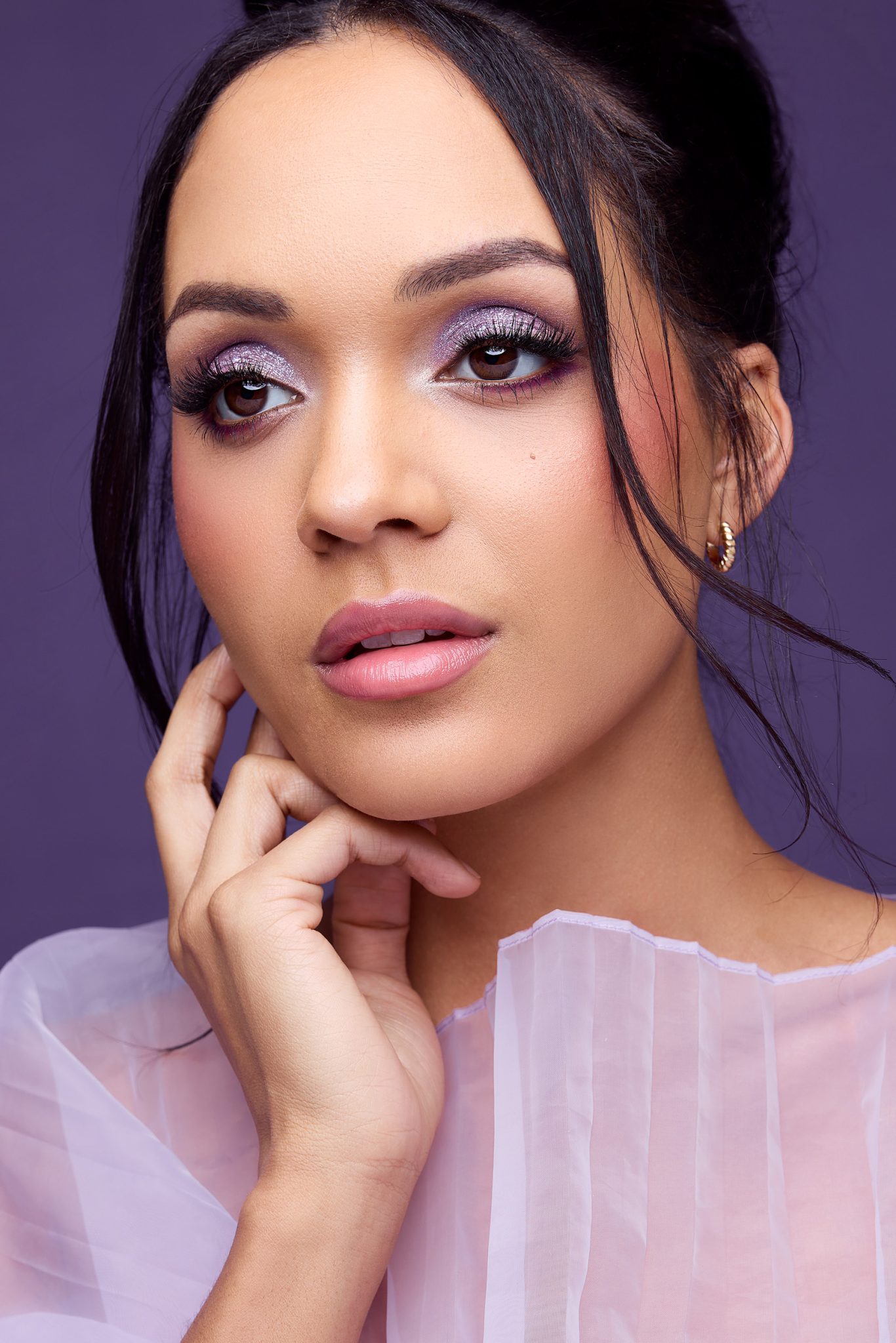 Beauty dish paired with the Westcott Eyelighter reflector to fill shadows and create brighter catchlights.