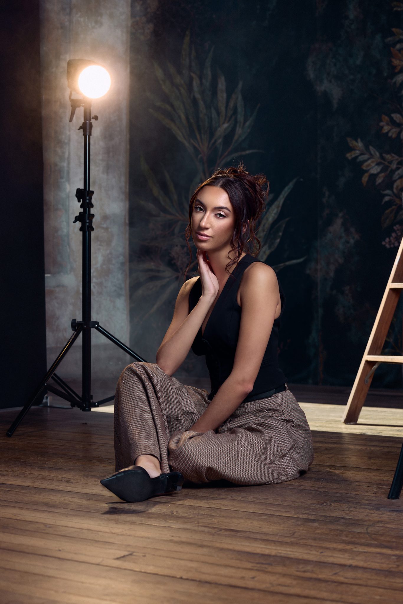 Final photo uses controlled flash lighting for a clean dramatic portrait.