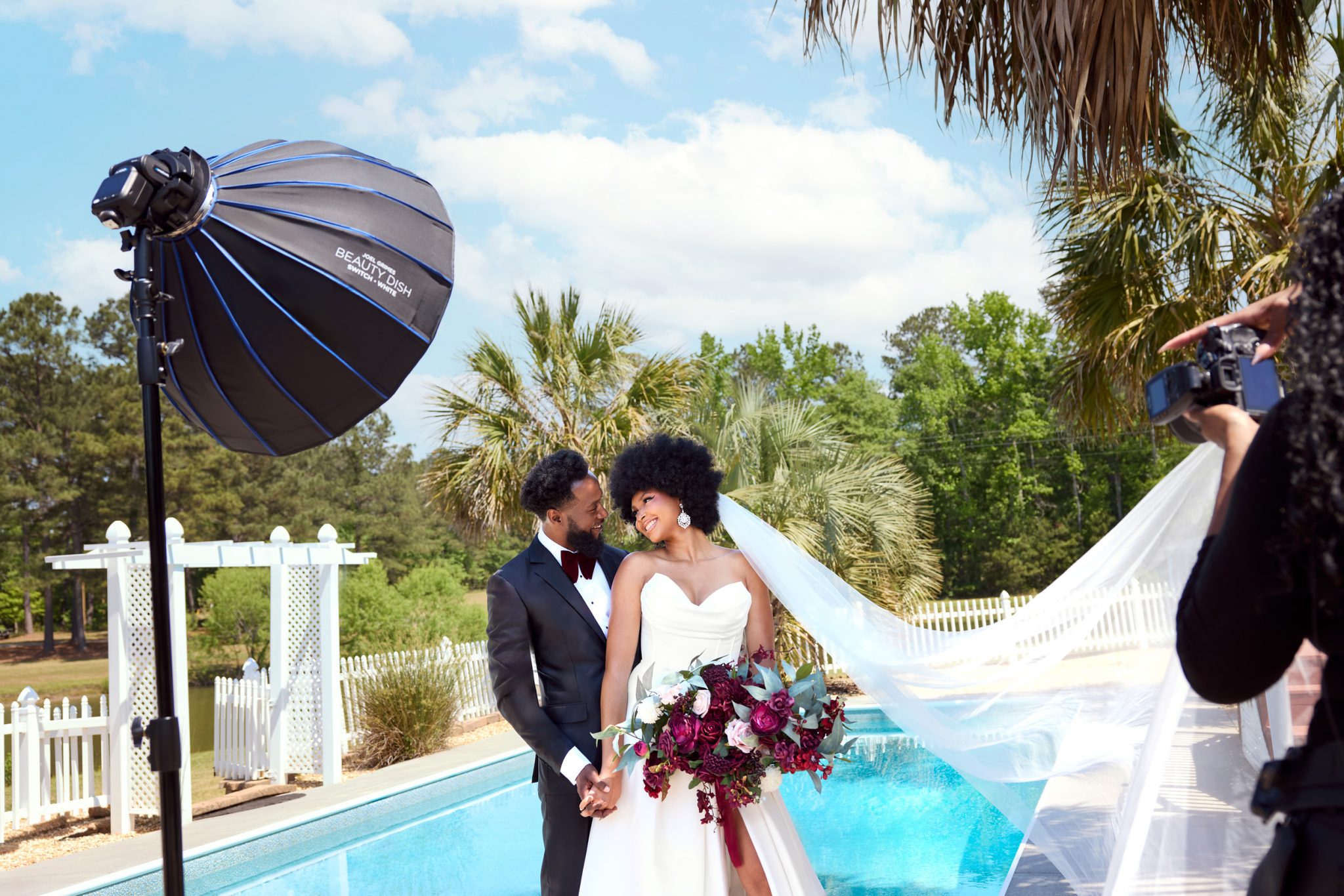 Behind the scenes using the FJ100 and beauty dish for soft, balanced outdoor fill.