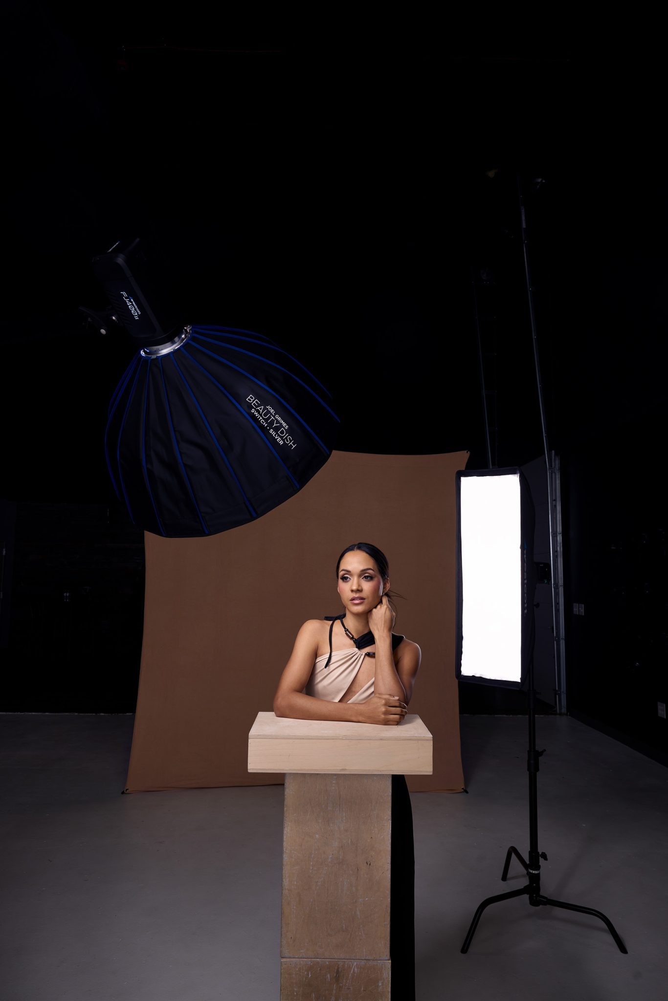Behind the scenes with a beauty dish key light, FJ800 for wall bounce fill, and a rim light.