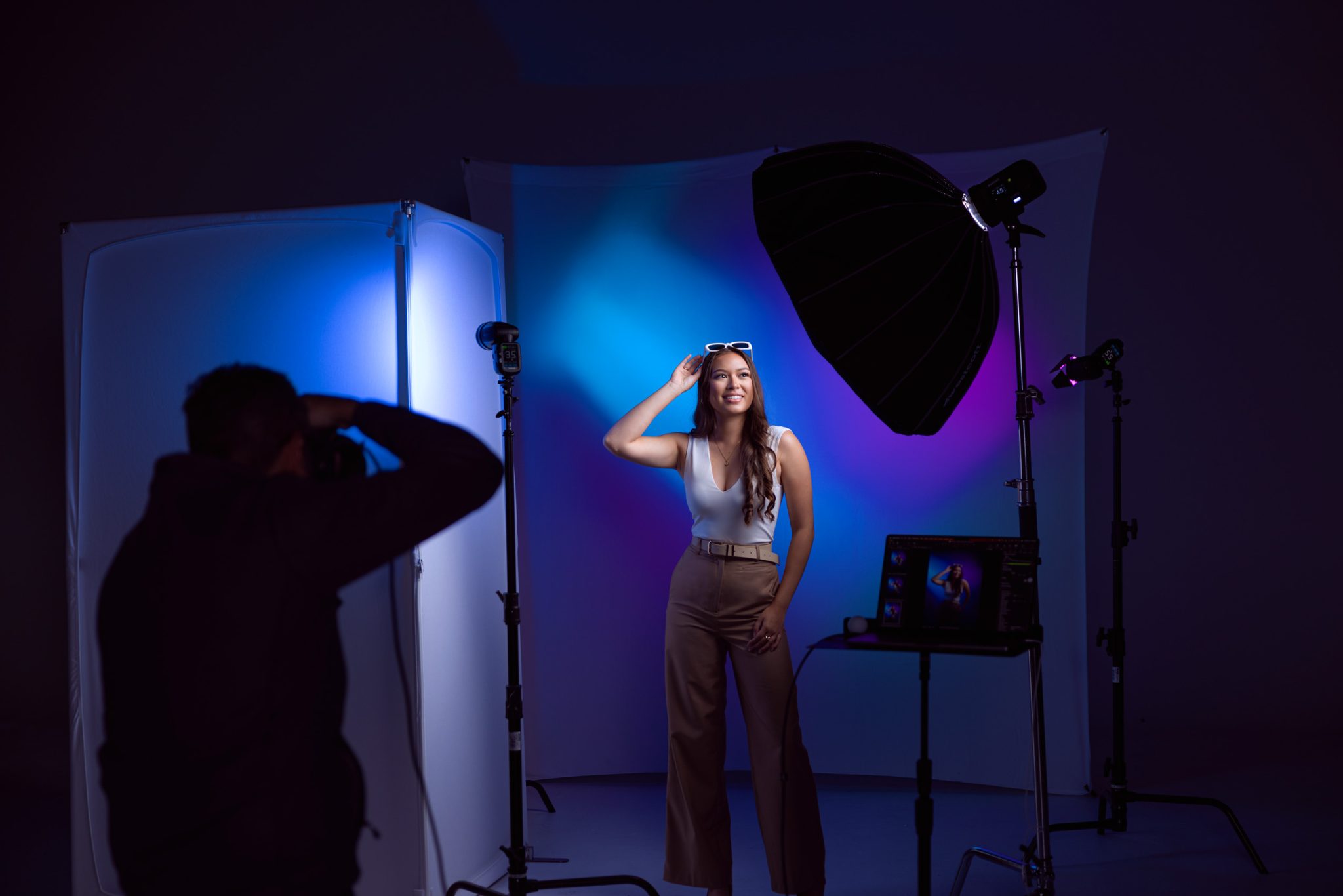 Behind the scenes with gelled FJ80 II speedlights shaping teal and purple light across the backdrop.