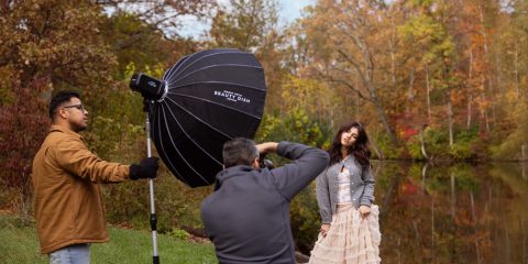 Behind the scenes outdoor portrait lighting setup of the Westcott FJ250 and 36-inch Beauty Dish placed to the side for loop lighting