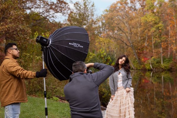Behind the scenes outdoor portrait lighting setup of the Westcott FJ250 and 36-inch Beauty Dish placed to the side for loop lighting