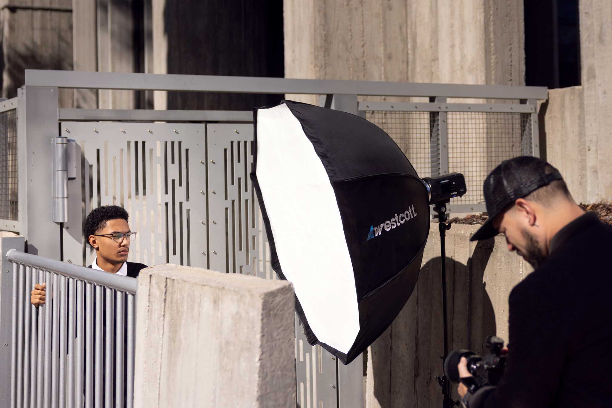 Behind the scenes of setup shows flash used as fill to enhance natural light.