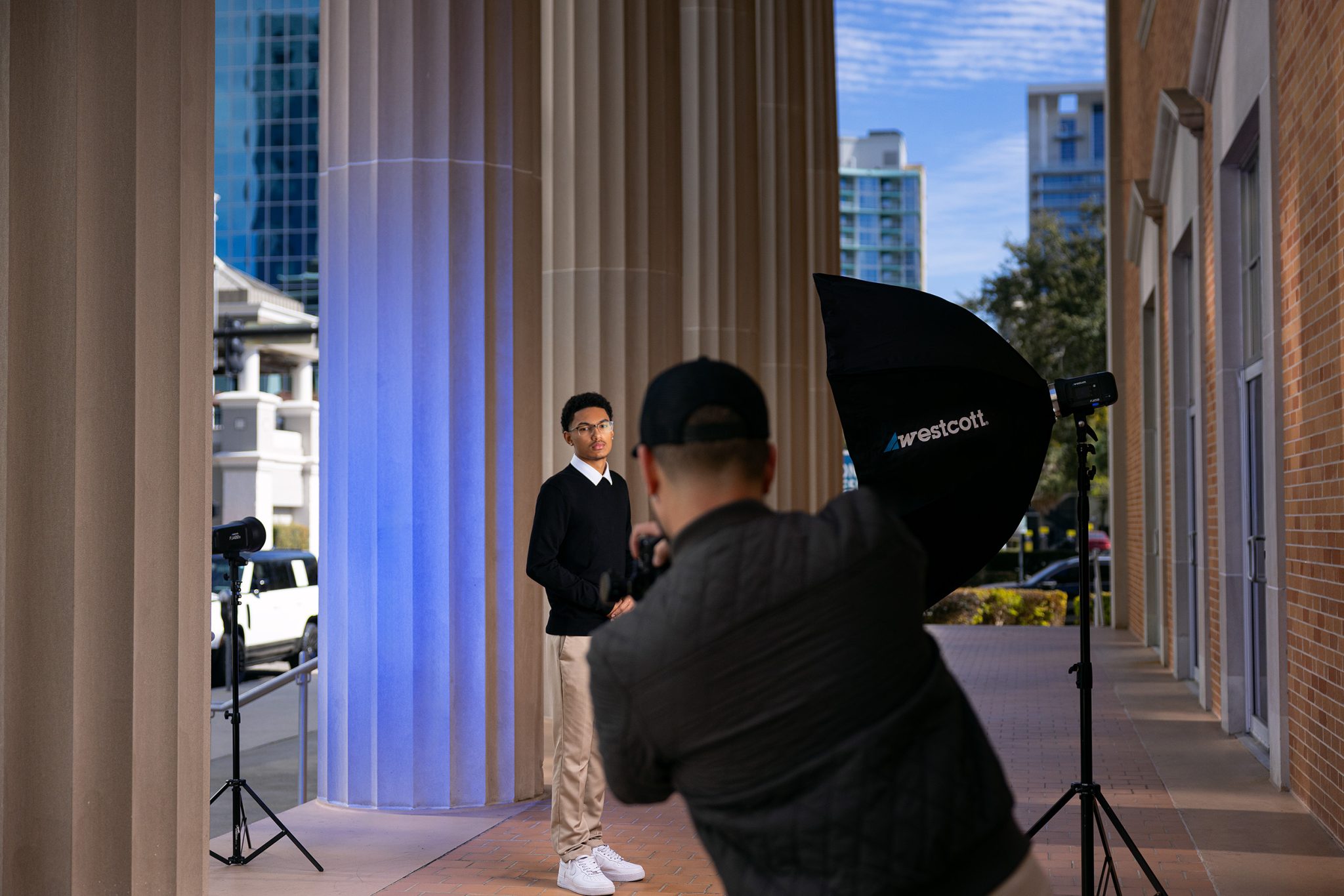 Behind the scenes of setup shows how gels and strobes transform the scene.