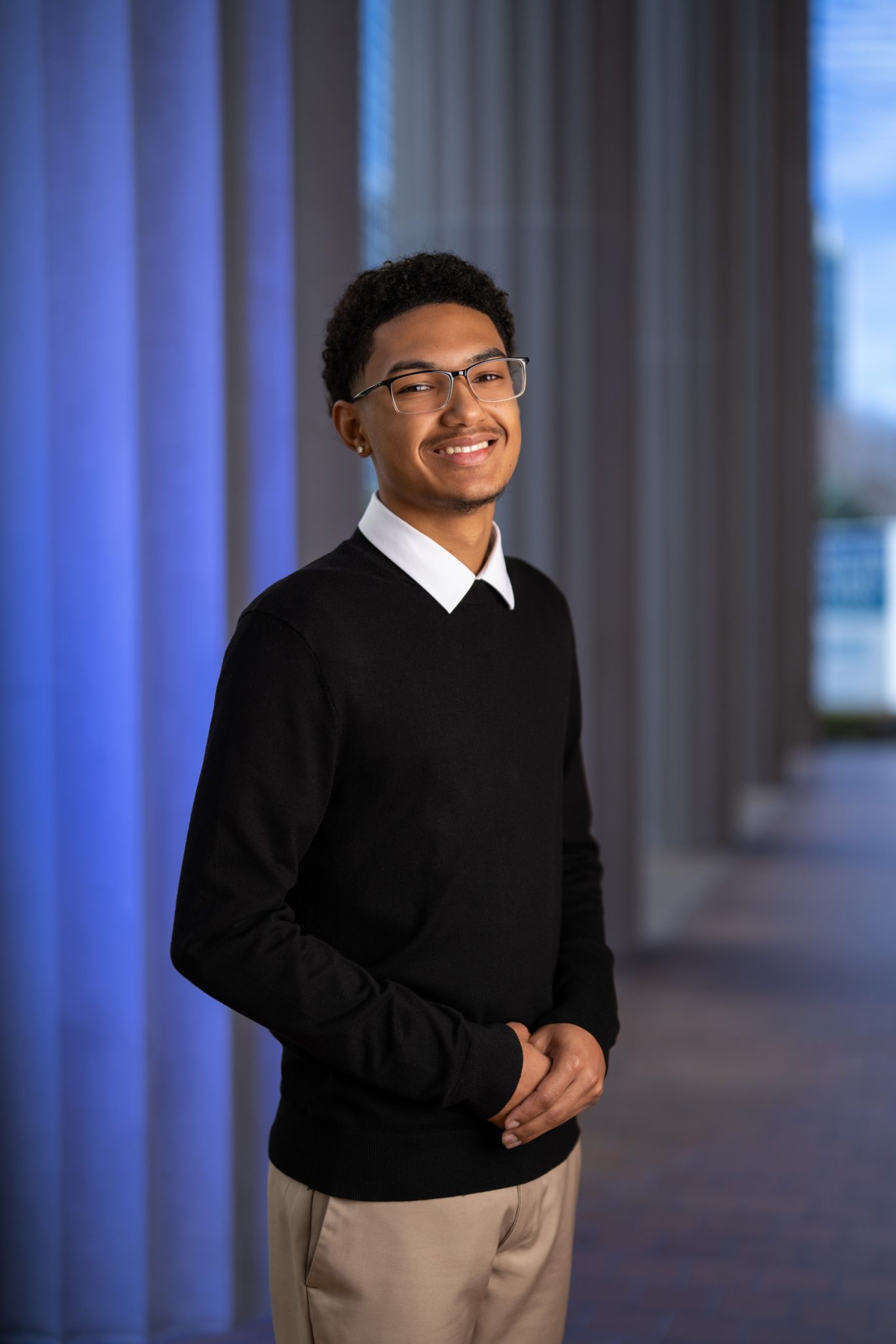 Final photo with all lights combines gelled background light with a key light for a dramatic look.