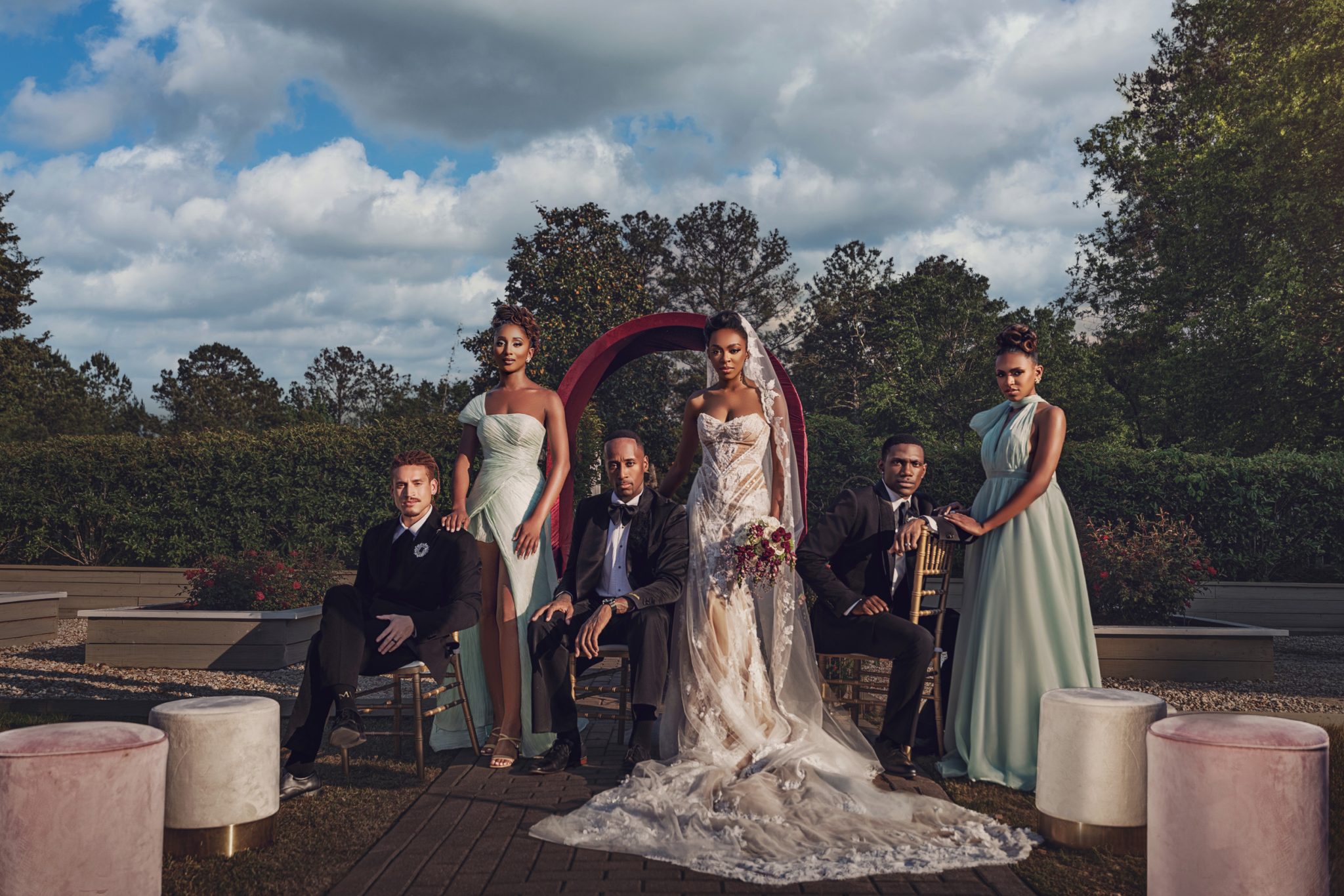 Final photo uses a layered setup with seated and standing subjects to create depth in the group portrait.