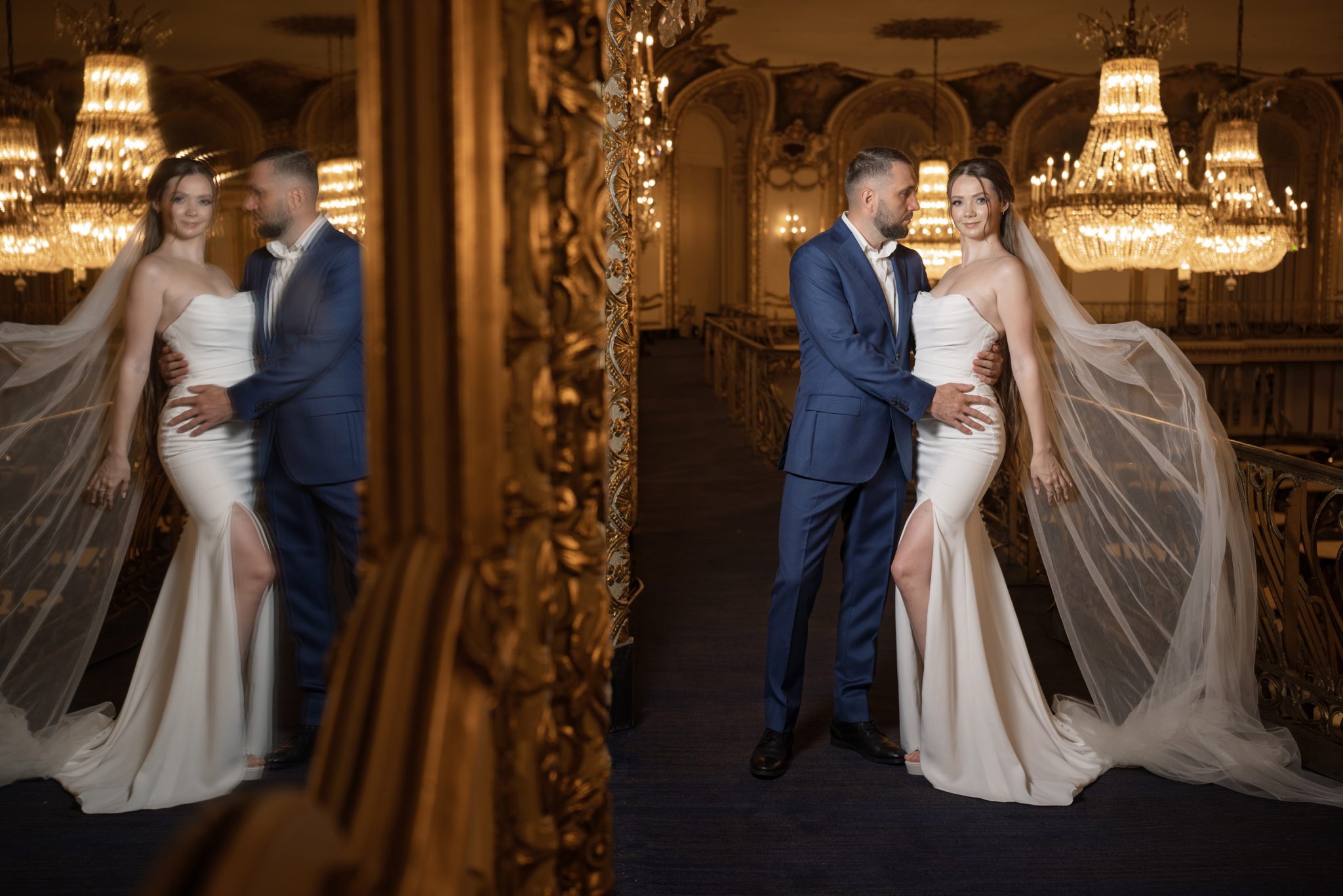 Mirror reflection frames the couple while keeping the off-camera light hidden from view.