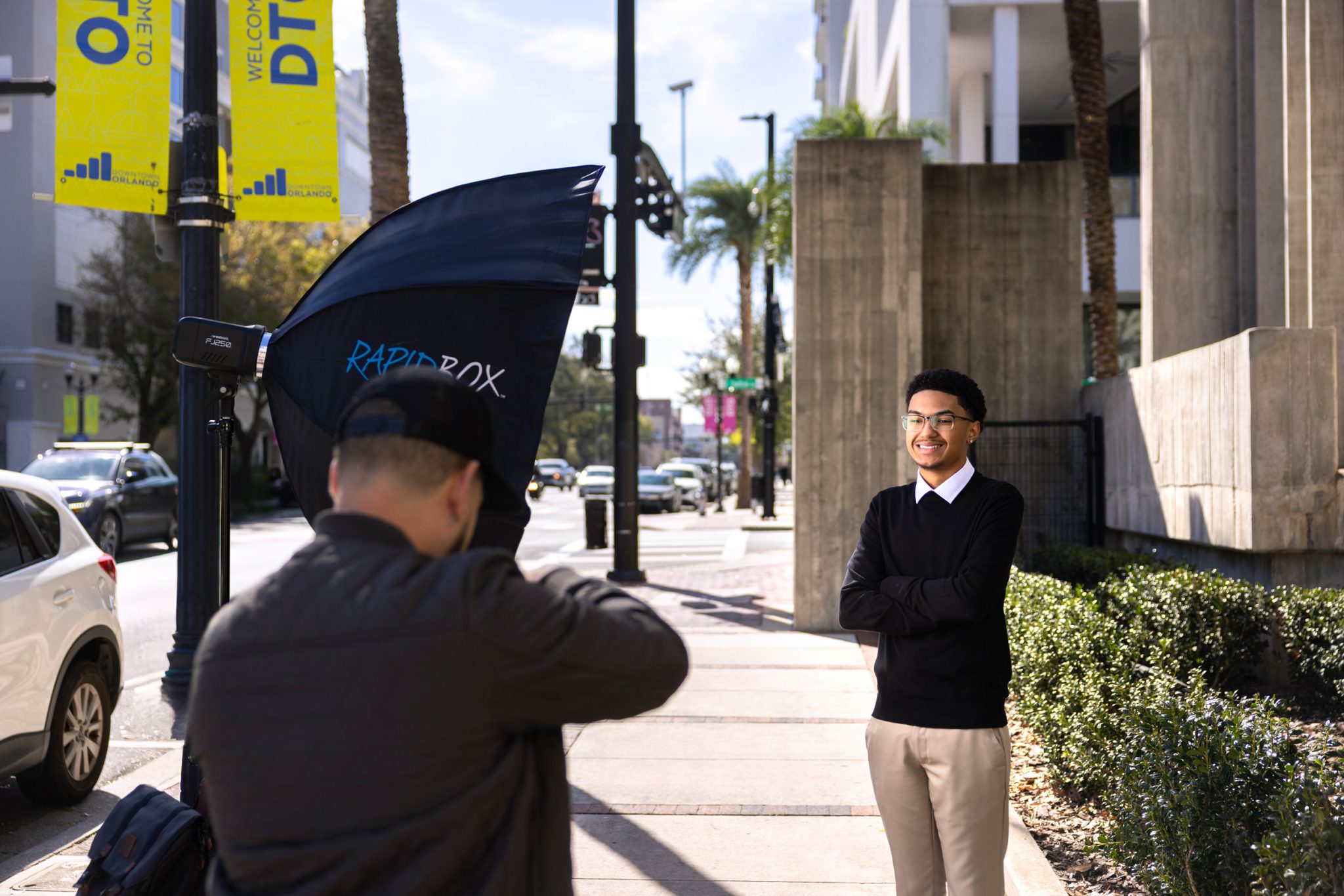 Behind the scenes of setup shows how flash is balanced with ambient light outdoors.