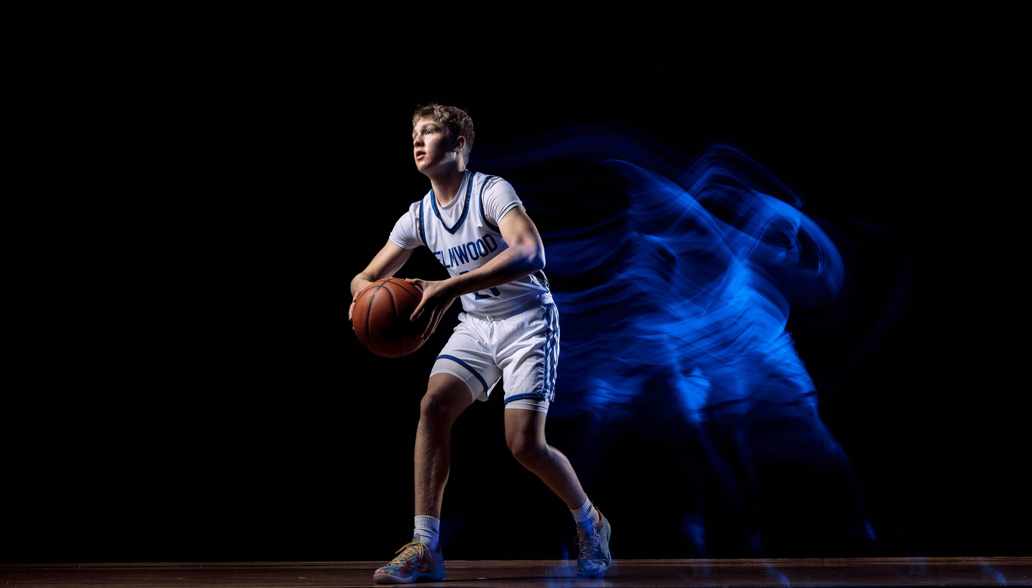 Sports Action Shot with Light Trails Sports Action Shot of a basketball player with Light Trails